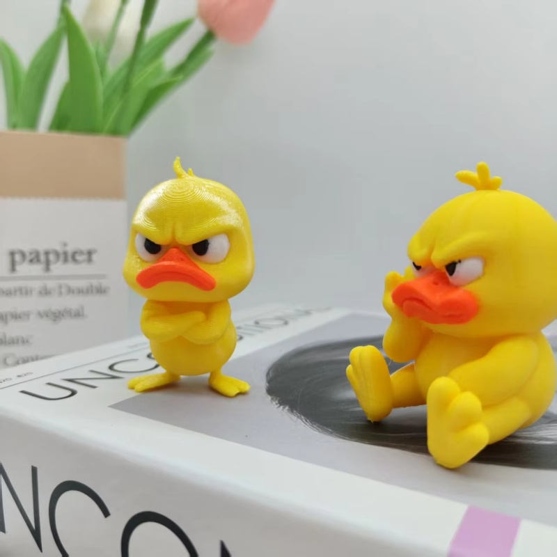 3Dプリントの怒った黄色いアヒル像、怒った白い目をした面白い - Art Craft Duck のレビューと価格