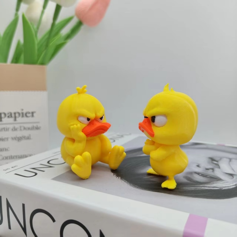 3Dプリントの怒った黄色いアヒル像、怒った白い目をした面白い - Art Craft Duck のレビューと価格